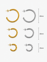 Dhana Hoops size comparison in 40mm, 30mm, and 25mm, featuring gold and silver twisted rope hoop earrings from Delani Jewelry. Waterproof, tarnish-proof stainless steel hoops with a Lifetime Color Guarantee, showcasing all three sizes for easy comparison.