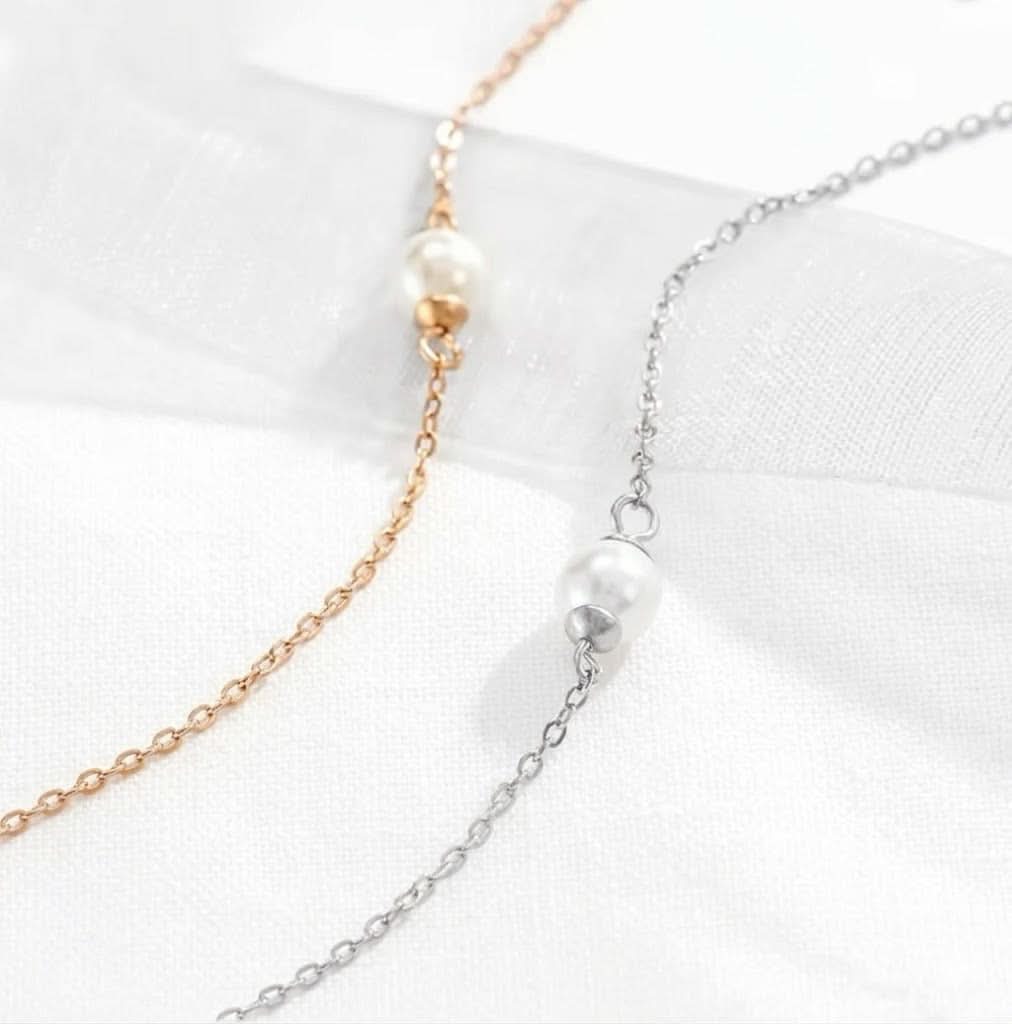 Delani Jewelry Anastasia bracelet featuring elegant silver chain and subtle charm, displayed on a neutral background.
