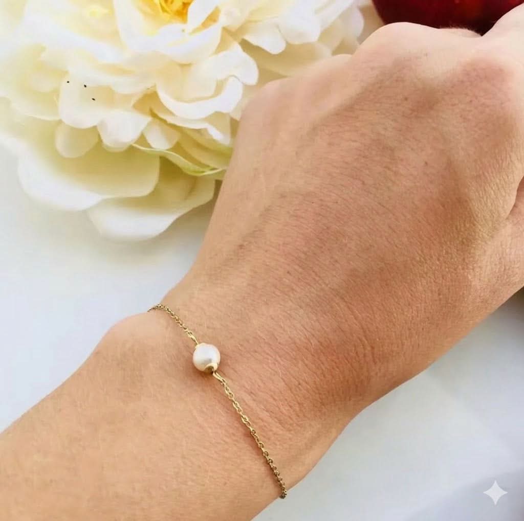 Delani Jewelry Anastasia bracelet featuring elegant silver chain and intricate charm design, suitable for stylish accessories.