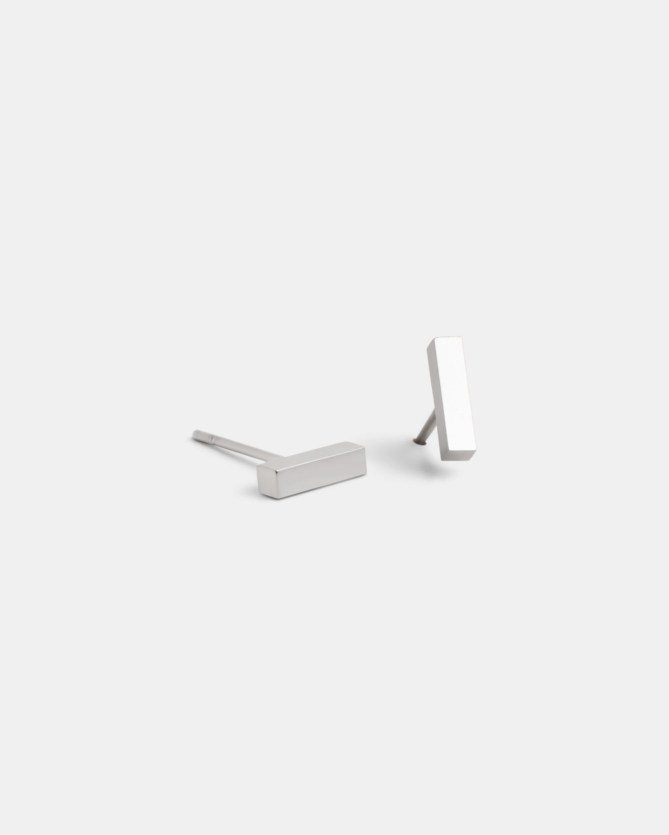 Delani Jewelry silver bar stud earrings with a polished minimalist design, sleek stainless steel earrings for everyday wear and effortless style. Named Namaari Studs