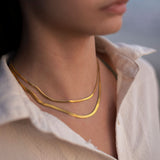 Delani Jewelry Reya Necklace featuring a delicate chain and elegant pendant, perfect for adding a touch of sophistication to any outfit.