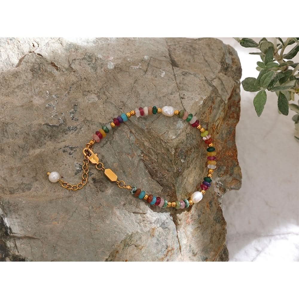 Elegant silver Demi Bracelet by Delani Jewelry featuring delicate chain links and subtle charm details.