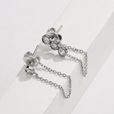 Silver Shyla chain drop earrings featuring three bezel-set stones and delicate chain detail from Delani Jewelry. Waterproof, tarnish-proof, hypoallergenic jewelry with a lifetime guarantee.Mismatched stones numbers create a drama and appeal unique to the Shyla Earrings. 